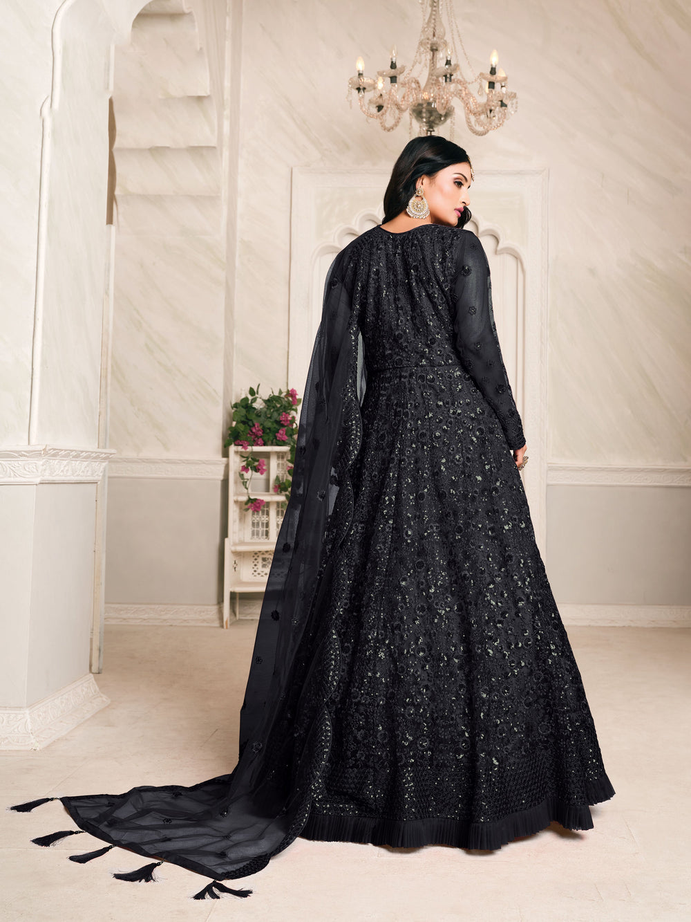 Chic black salwar kameez showcasing intricate embroidery, perfect for modern women attending festive occasions in the USA.