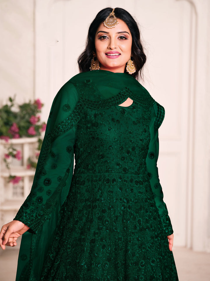 Beautifully crafted dark green salwar suit set, ideal for weddings and festive gatherings with luxurious fabric.