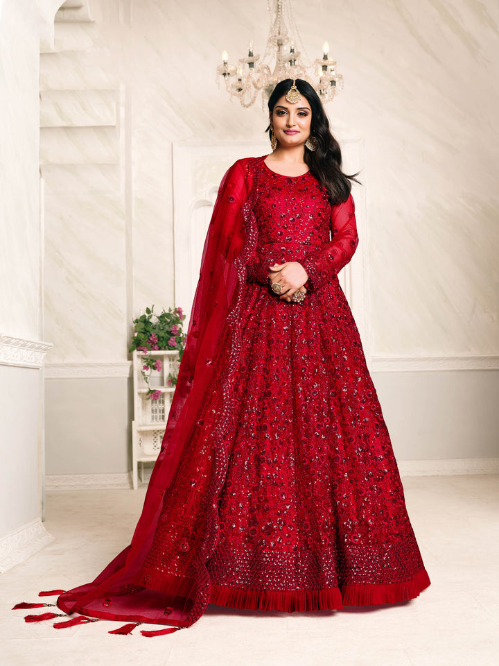 Vibrant red cotton salwar kameez set, perfect for celebrations, featuring comfortable fabric and stylish design.