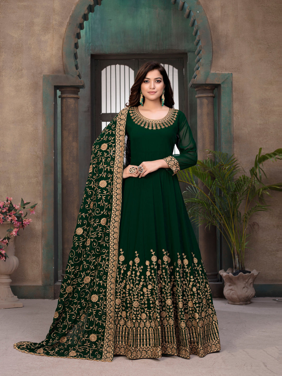 Chic green traditional salwar kameez set, perfect for events, featuring beautiful embroidery and elegant design.