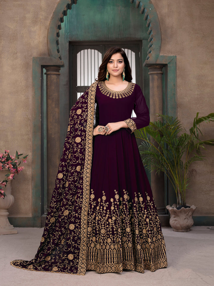 Regal purple women's salwar kameez set, perfect for festivals, featuring exquisite detailing and luxurious design.