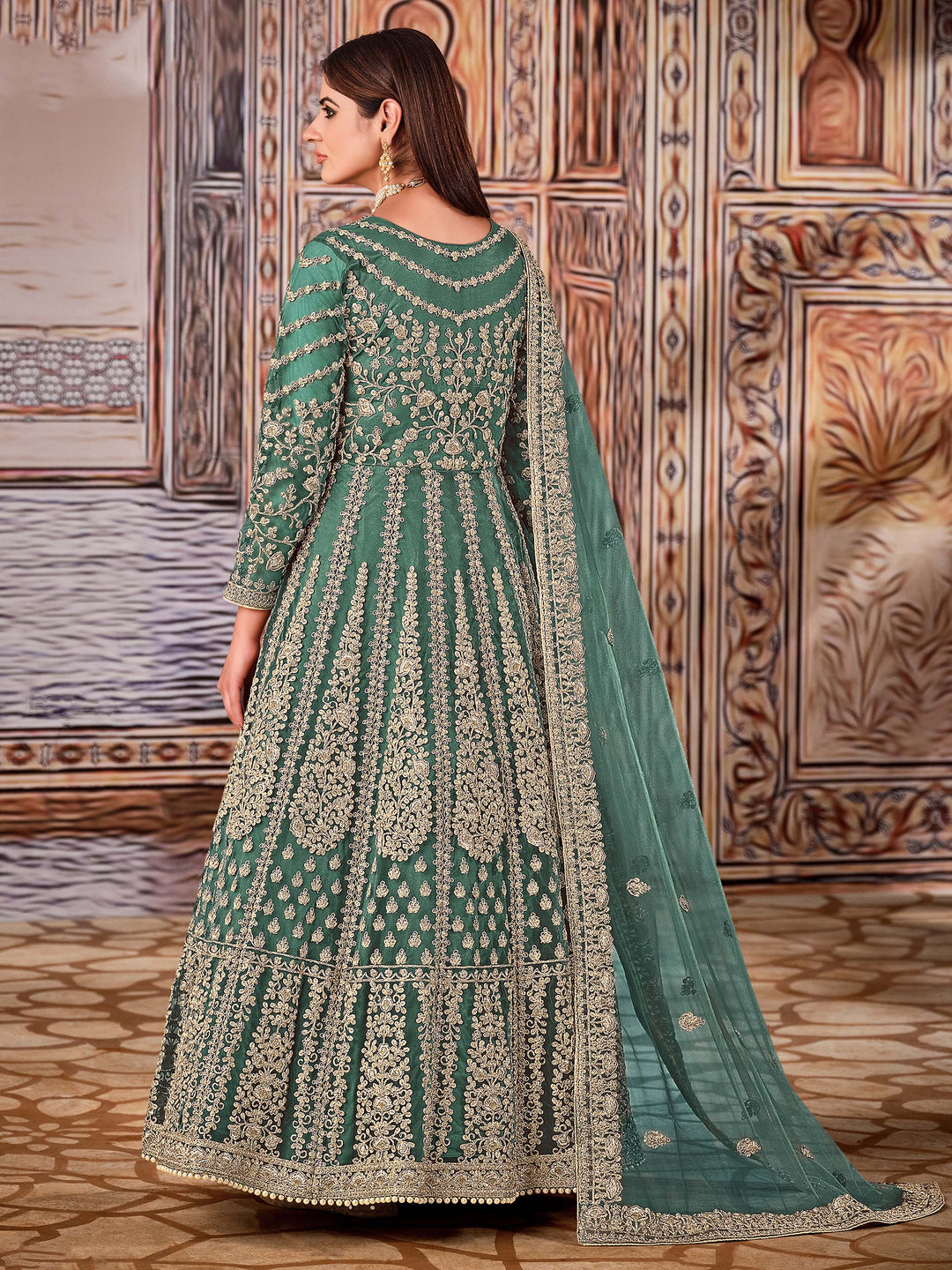 Chic Rama green salwar kameez showcasing exquisite craftsmanship, designed for modern women celebrating special events.