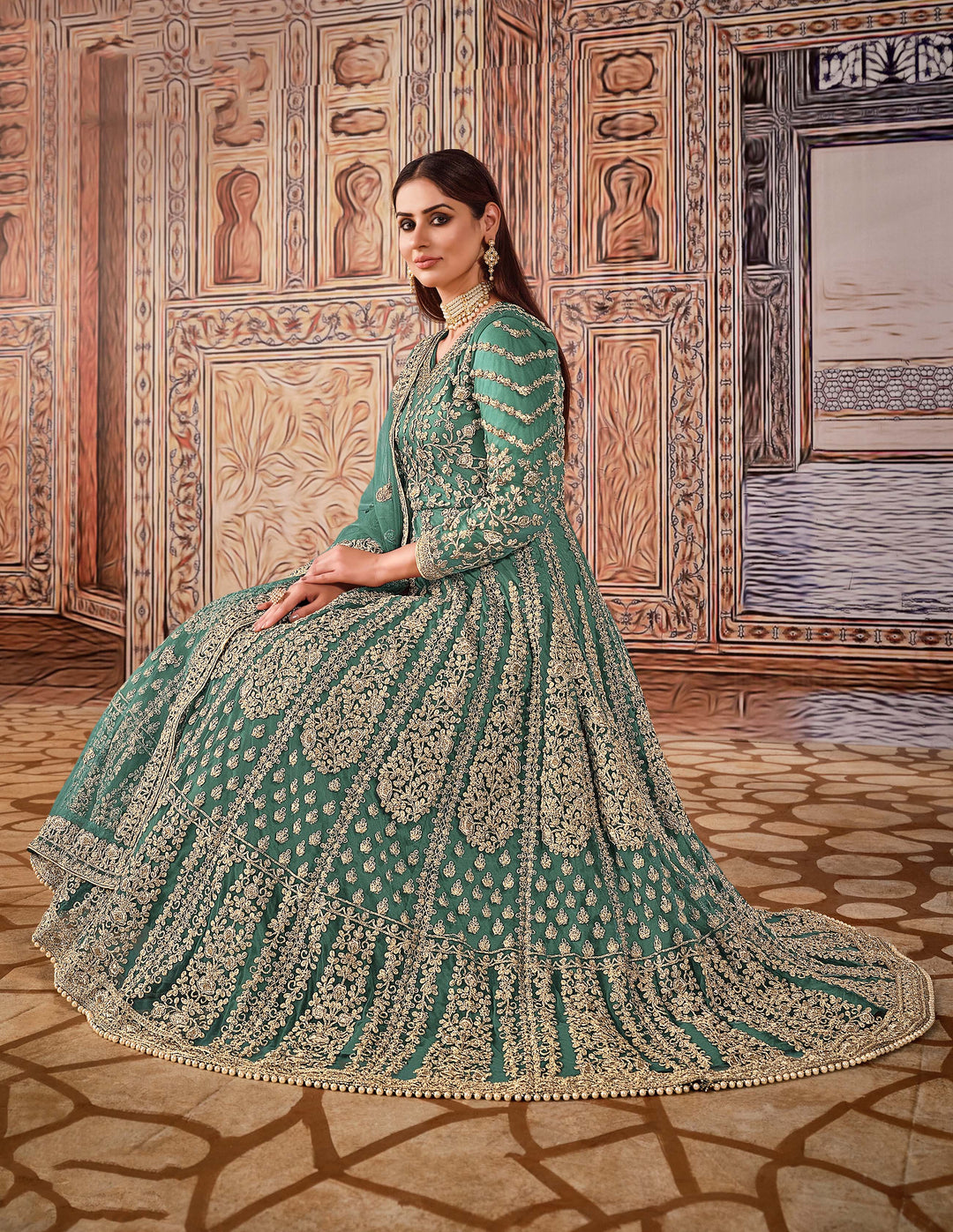 Beautifully crafted Rama green salwar kameez set, ideal for weddings and gatherings with luxurious fabric and stylish fit.