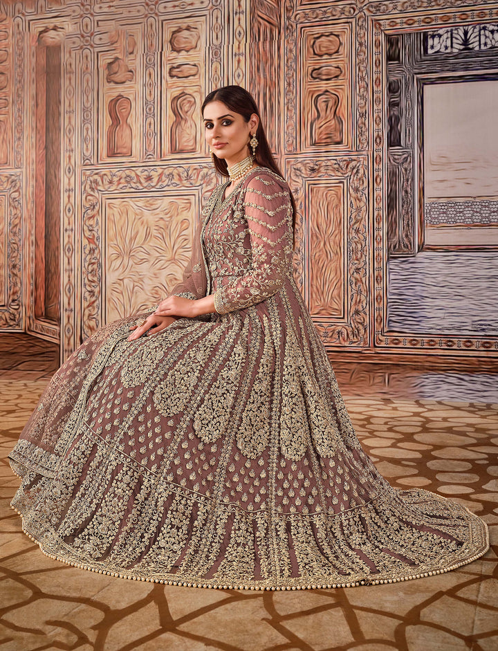 Beautifully crafted brown salwar kameez set, ideal for weddings and festive gatherings with luxurious fabric and fit.