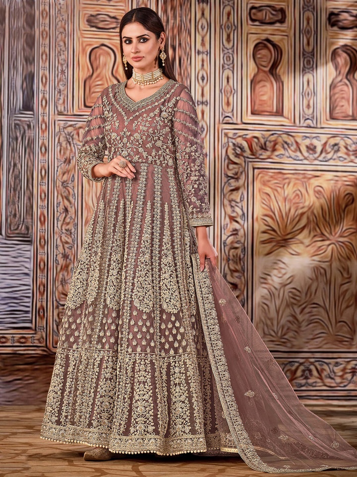 Classic brown salwar kameez set, a stunning designer ensemble, featuring beautiful embroidery and timeless design.