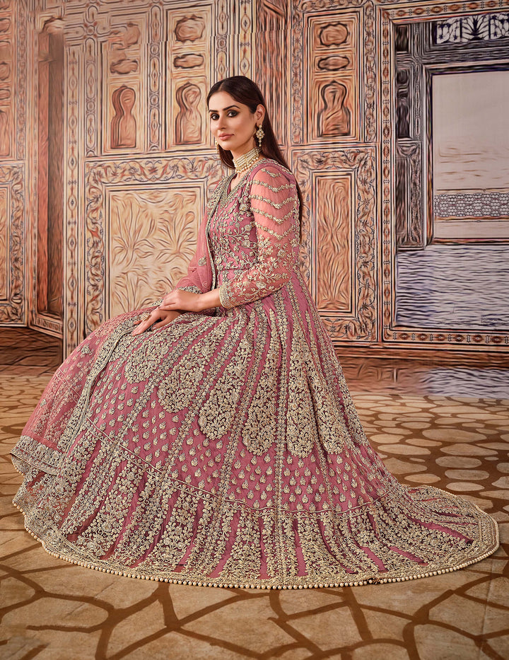 Beautifully crafted soft pink salwar kameez set, ideal for weddings and gatherings with luxurious fabric and stylish fit.