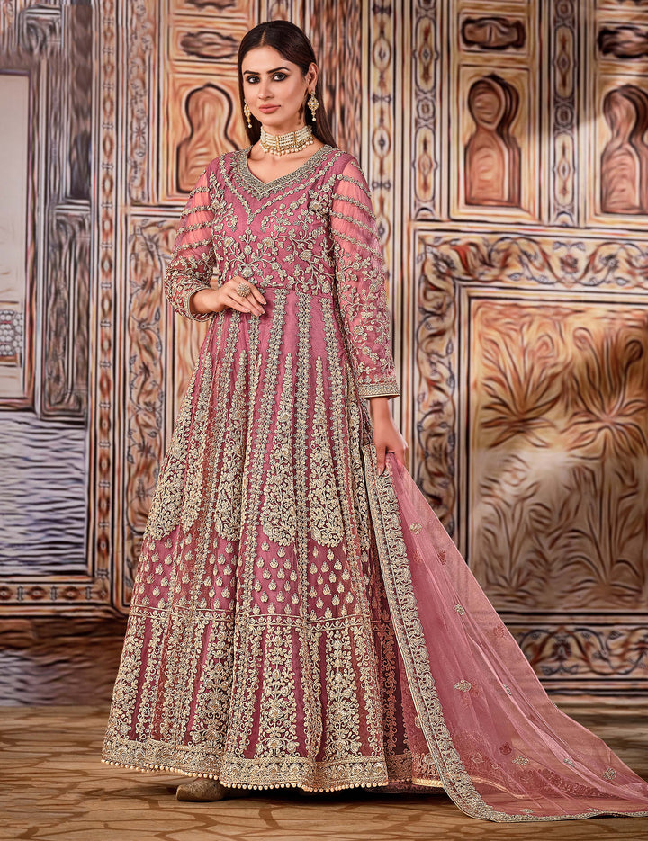 Soft pink salwar kameez set, perfect for parties, featuring gorgeous design and elegant embroidery details.