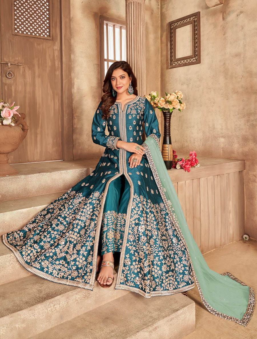 Stylish teal art silk salwar kameez, offering a perfect blend of tradition and comfort, ideal for special occasions.