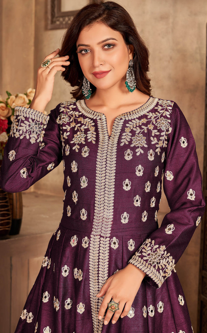 Beautifully crafted purple art silk salwar kameez, ideal for festive gatherings with luxurious fabric and elegant design.