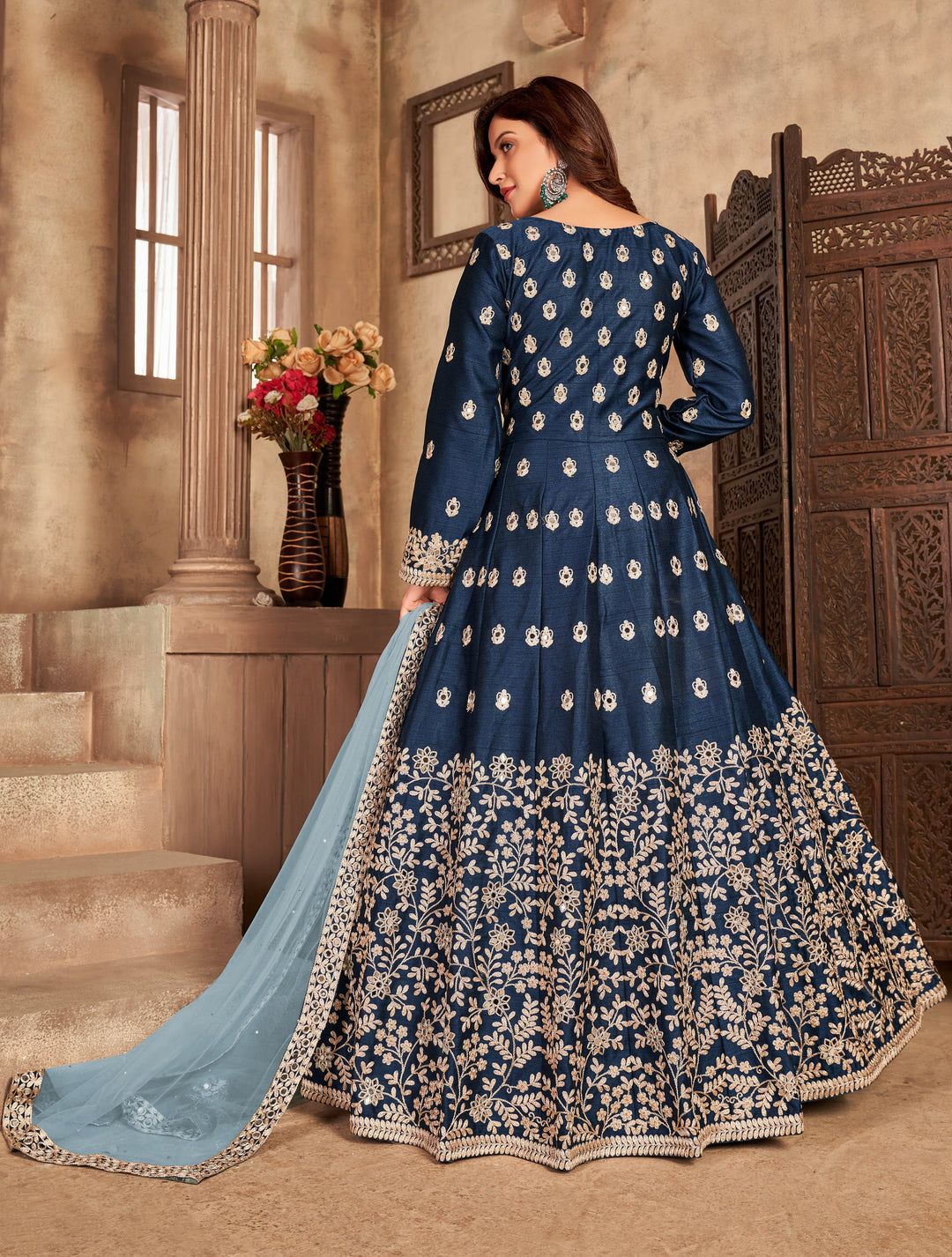 Beautifully crafted navy blue art silk salwar kameez, ideal for weddings and festive gatherings with luxurious fabric and style.