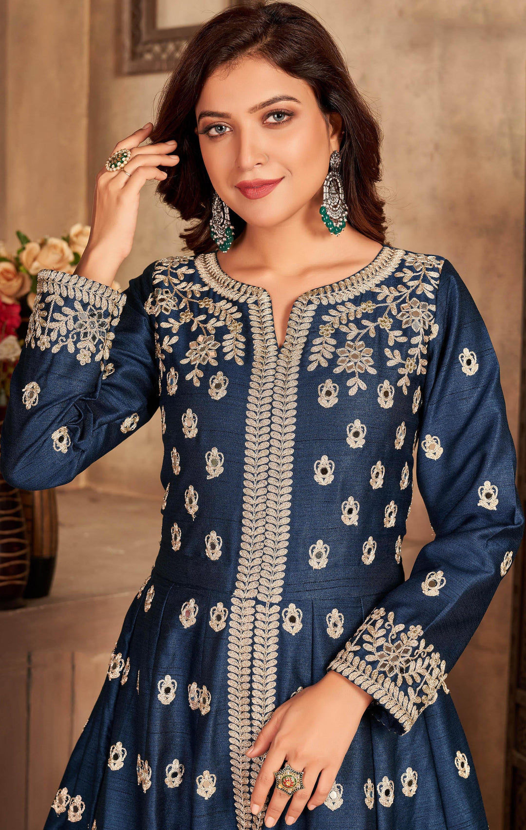 Elegant navy blue salwar kameez featuring eye-catching mirror work, perfect for enhancing your wardrobe for celebrations.