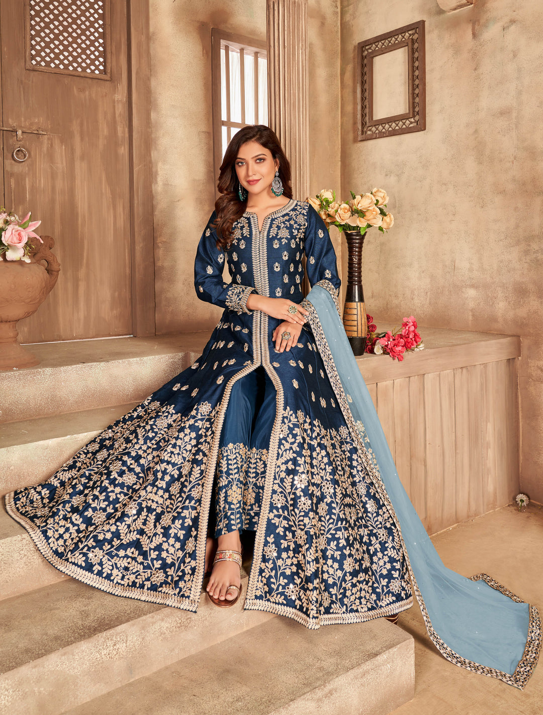 Chic navy blue salwar kameez showcasing intricate mirror detailing, designed for modern women celebrating special events in the USA.