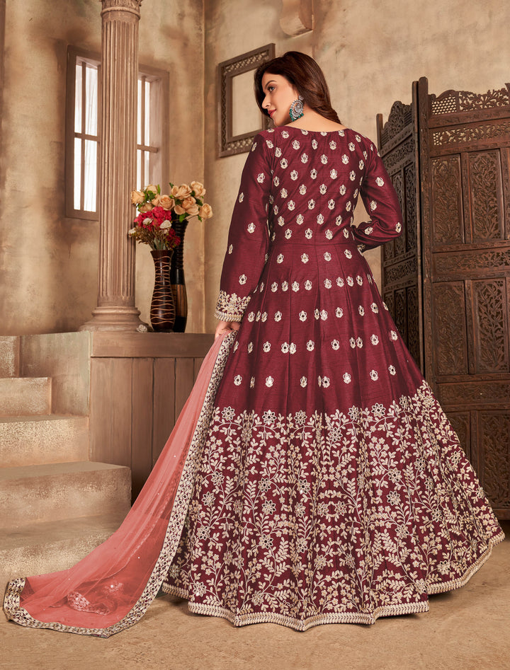 Beautifully crafted maroon art silk salwar kameez, ideal for weddings and celebrations with luxurious fabric and stylish fit.