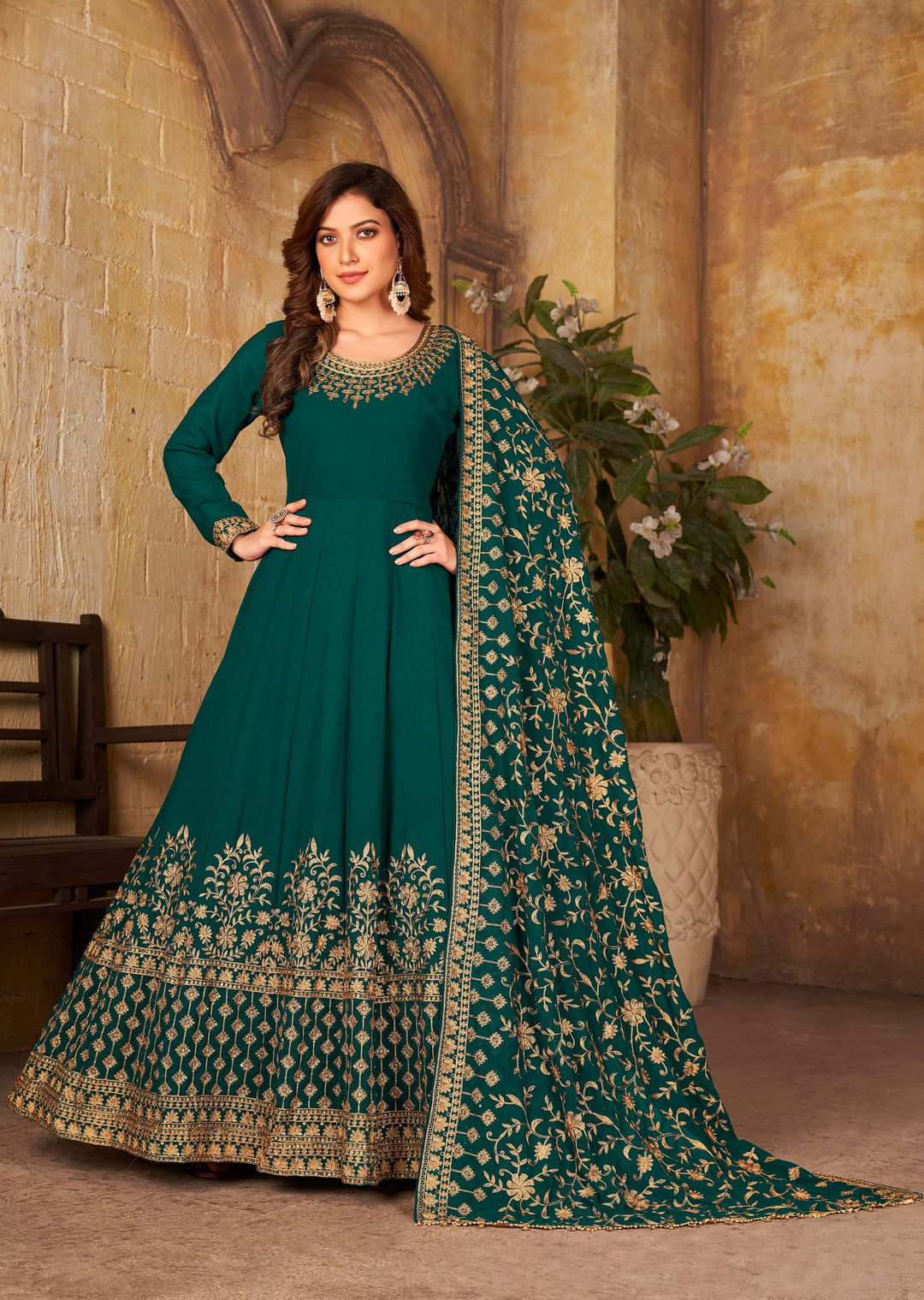 Elegant teal green salwar kameez crafted from stylish faux georgette with stunning work, perfect for festive occasions.