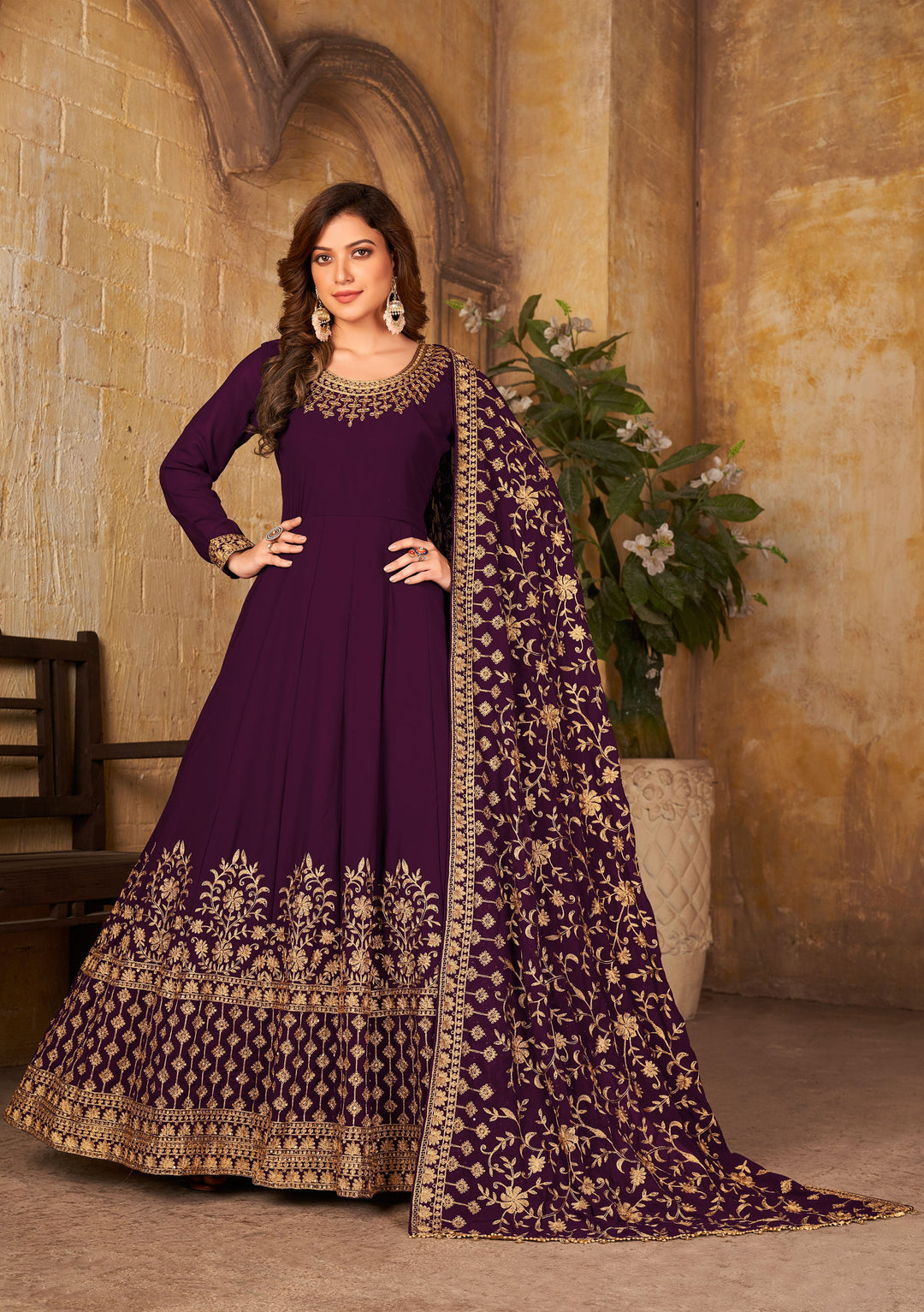 Glamorous purple salwar kameez made from beautiful faux georgette, perfect for celebrations and special events.