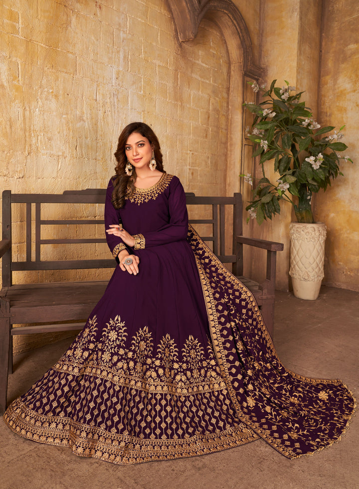 Stylish faux georgette salwar kameez in purple, ideal for weddings and gatherings with luxurious fabric and intricate details.