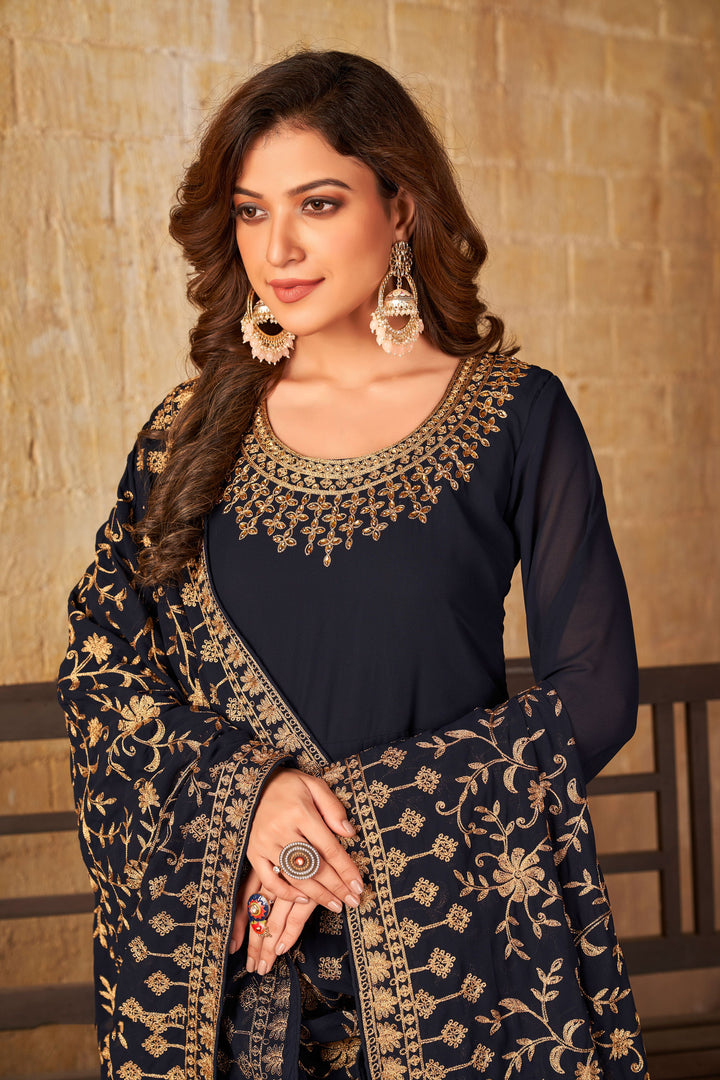 Chic navy blue salwar kameez designed for modern women, perfect for weddings and cultural gatherings in the USA.