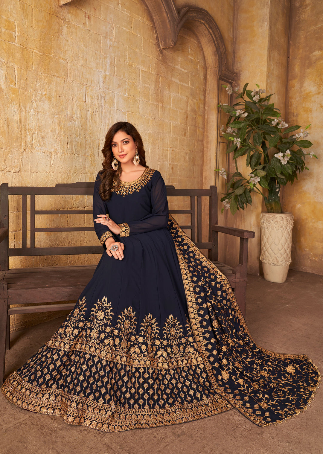 Luxurious navy blue salwar kameez featuring elegant design, crafted with exceptional attention to detail for festive wear.