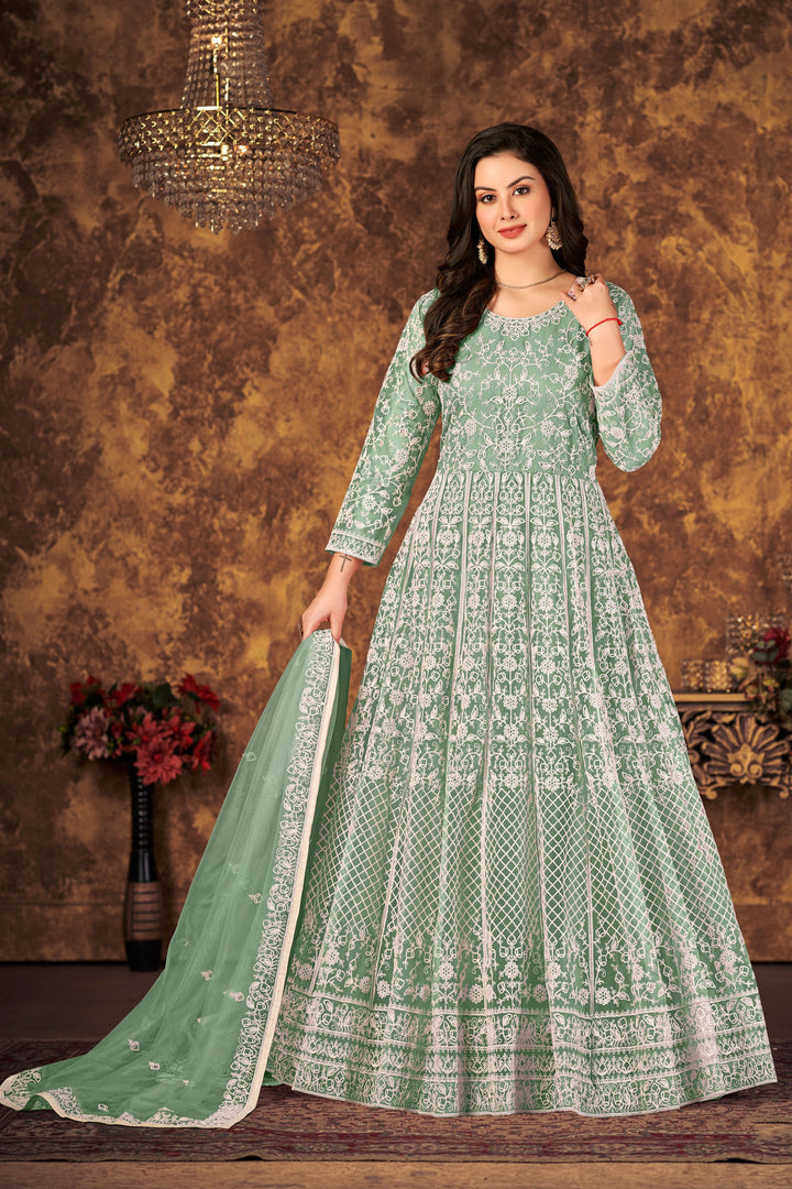 Transform your look with light green salwar kameez featuring elegant embroidery, perfect for festive occasions.