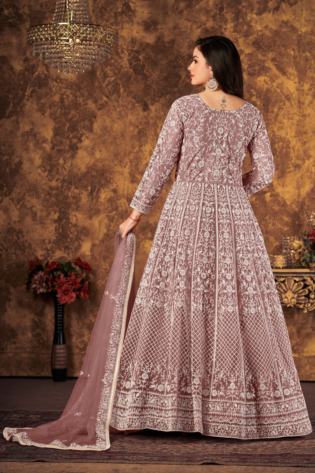 Elegant light brown salwar kameez featuring luxurious fabric and intricate details, perfect for enhancing your wardrobe.