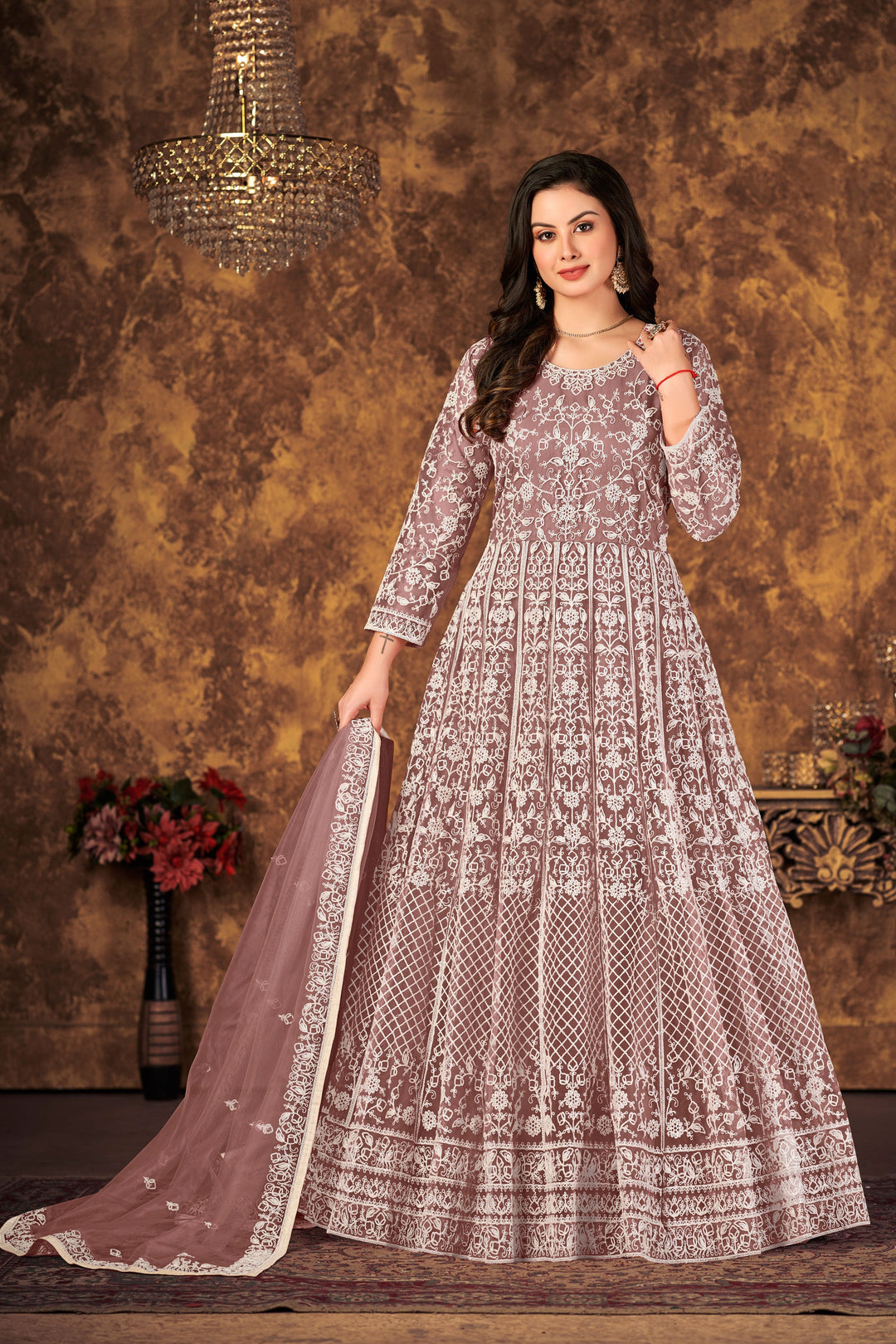 Indulge in luxury with light brown salwar kameez, perfect for festive occasions and elegant gatherings.