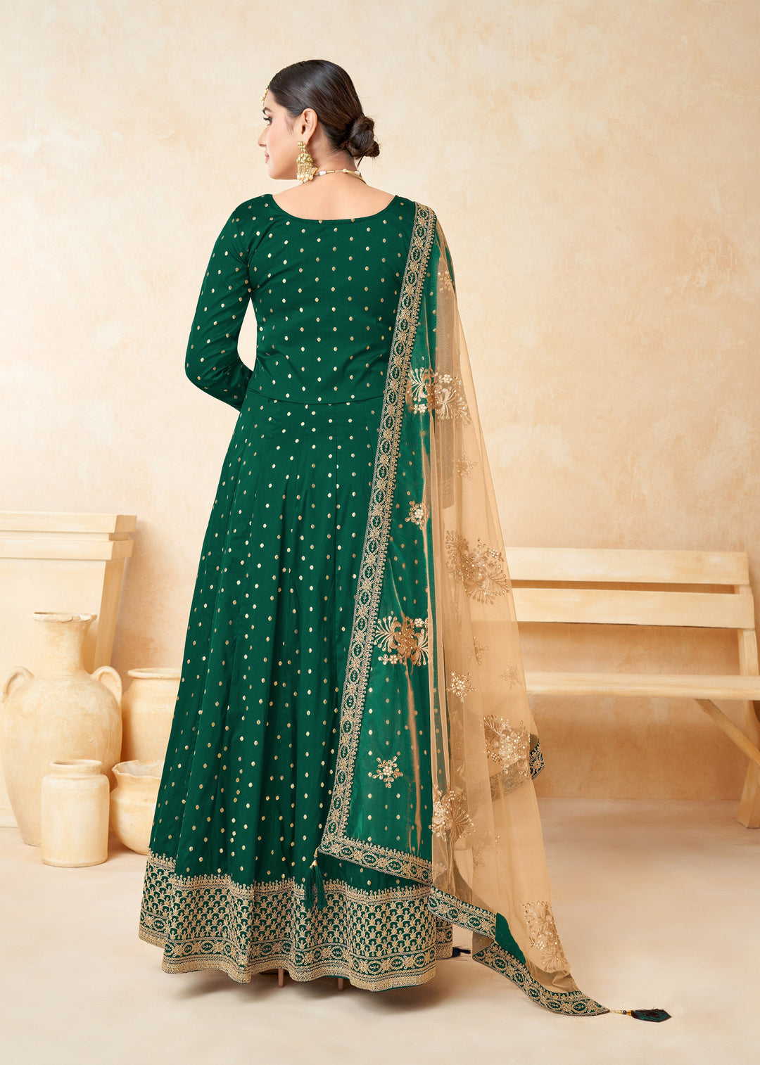 Beautifully crafted green salwar kameez showcasing elegant design, perfect for weddings and special gatherings.