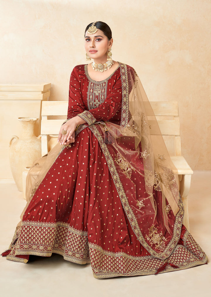 Stylish red salwar kameez featuring intricate design elements, perfect for enhancing your festive wardrobe.