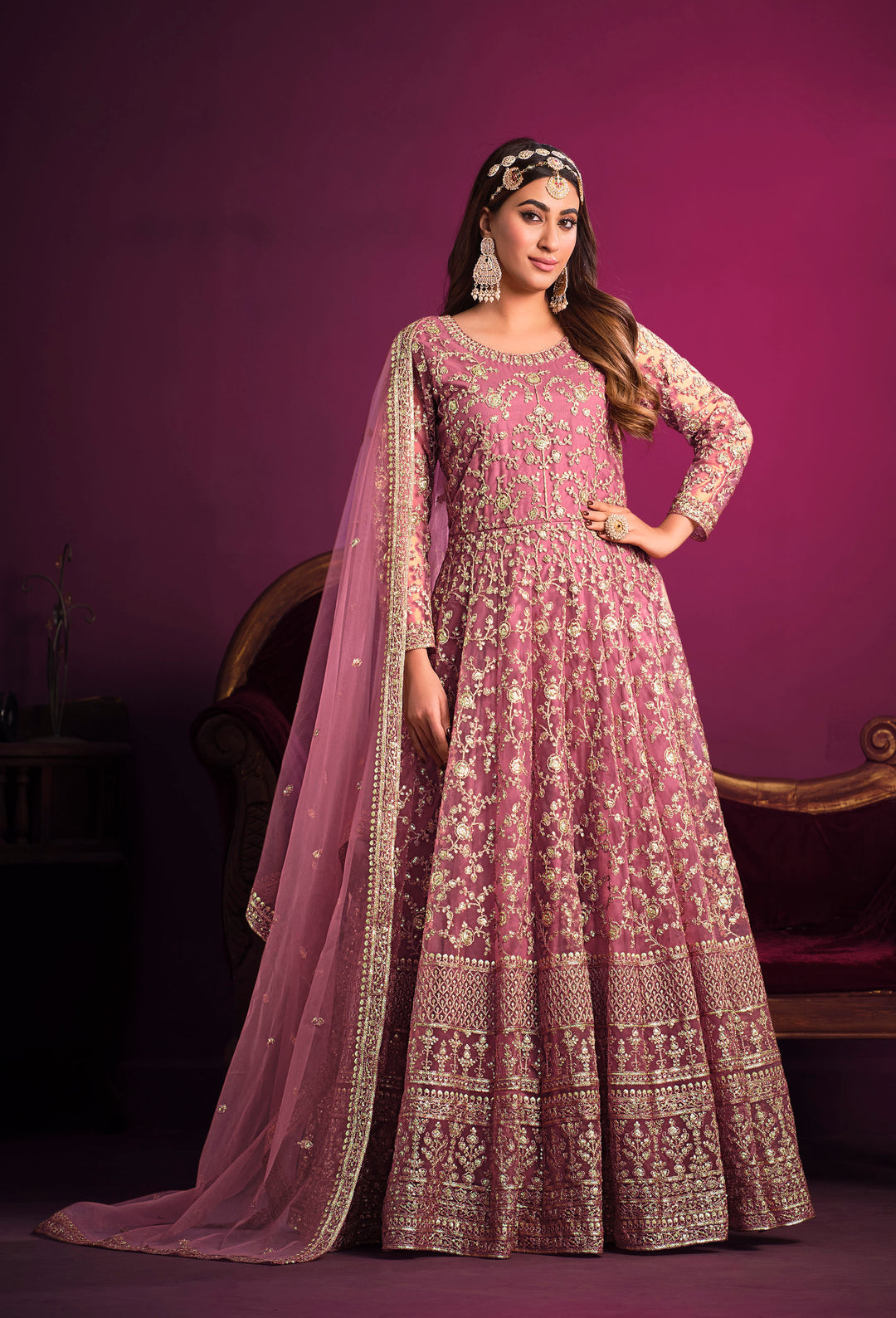 Beautifully crafted baby pink salwar kameez showcasing exquisite detailing, perfect for weddings and special gatherings.