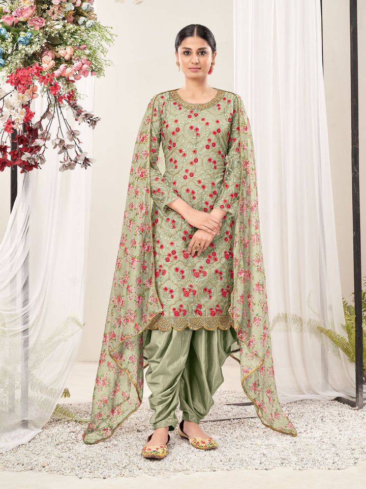 Pista green salwar kameez featuring elegant embroidery, perfect for festive occasions and special events.