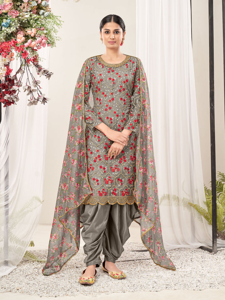 Grey salwar kameez set featuring intricate embroidery, ideal for festive gatherings and special occasions.