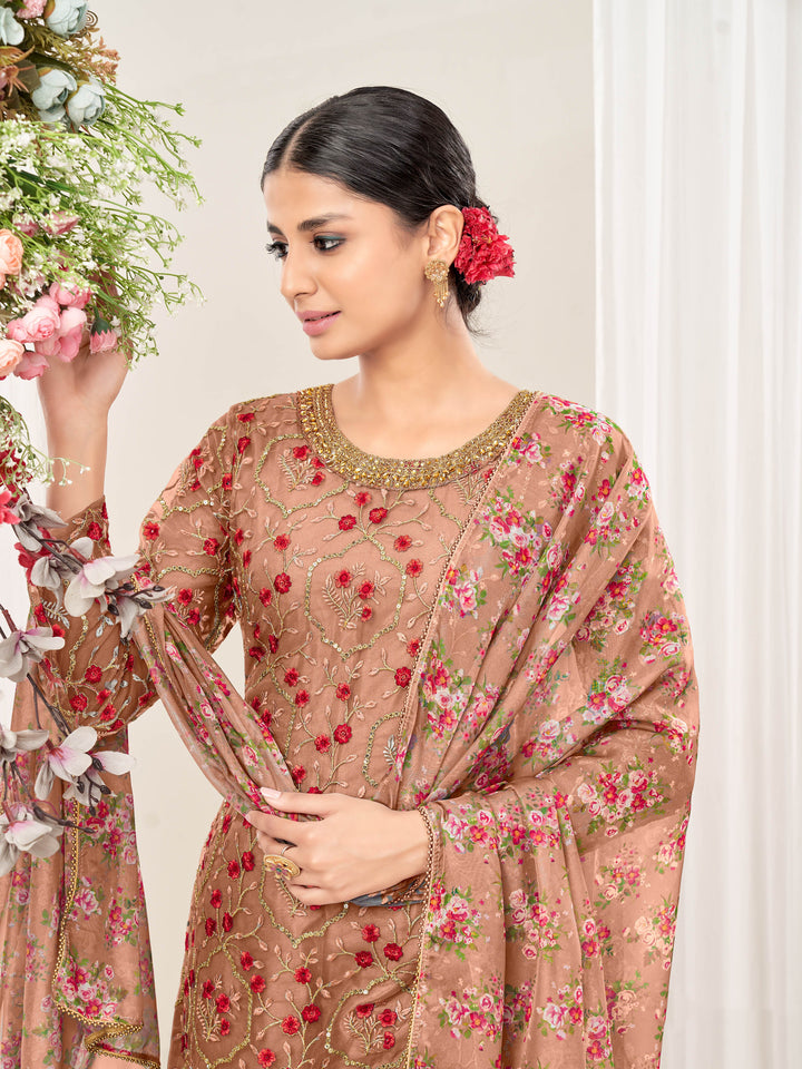 Beautifully crafted brown salwar kameez showcasing exquisite detailing for weddings and special occasions.