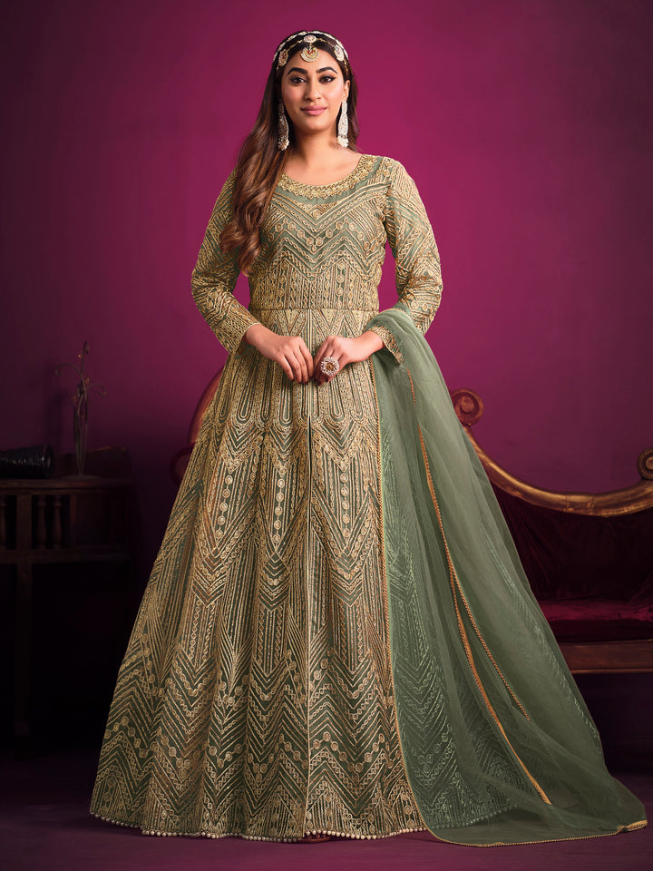 Sea green salwar kameez featuring heavy thread embroidery, zari, and sequins work, perfect for festive occasions.