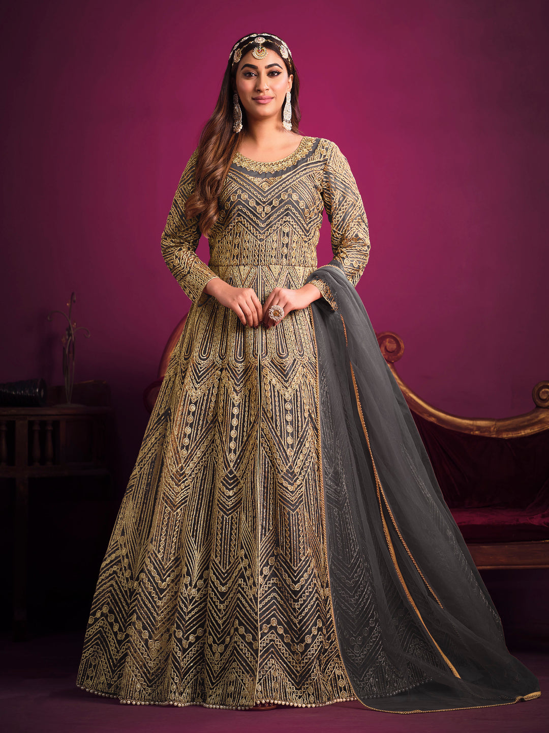 Charcoal salwar kameez featuring heavy thread embroidery, zari, and sequins work, ideal for special occasions.