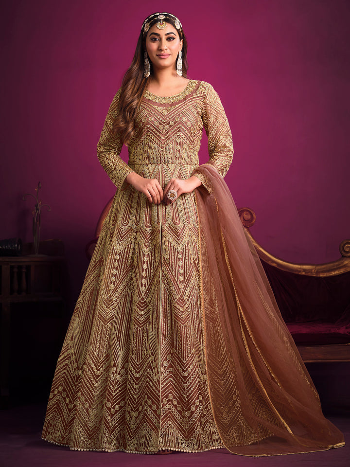 Beautifully crafted light brown salwar kameez showcasing exquisite detailing for weddings and special gatherings.