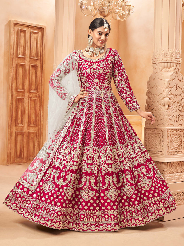 Vibrant ruby salwar kameez designed for modern women, ideal for celebrations.