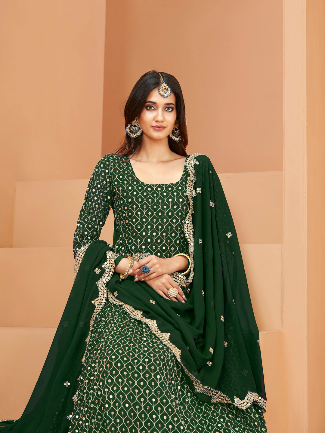 Elegant green salwar kameez designed for festive occasions and cultural events.