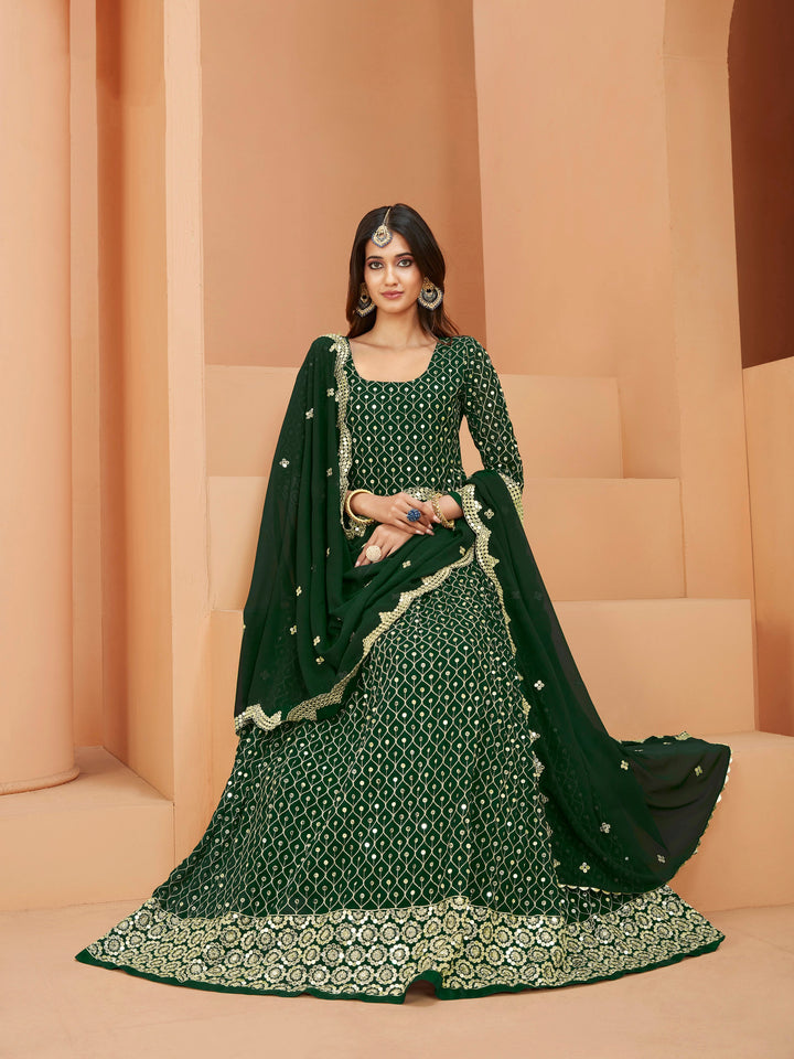 Stunning green salwar kameez showcasing intricate detailing with sequins for celebrations.