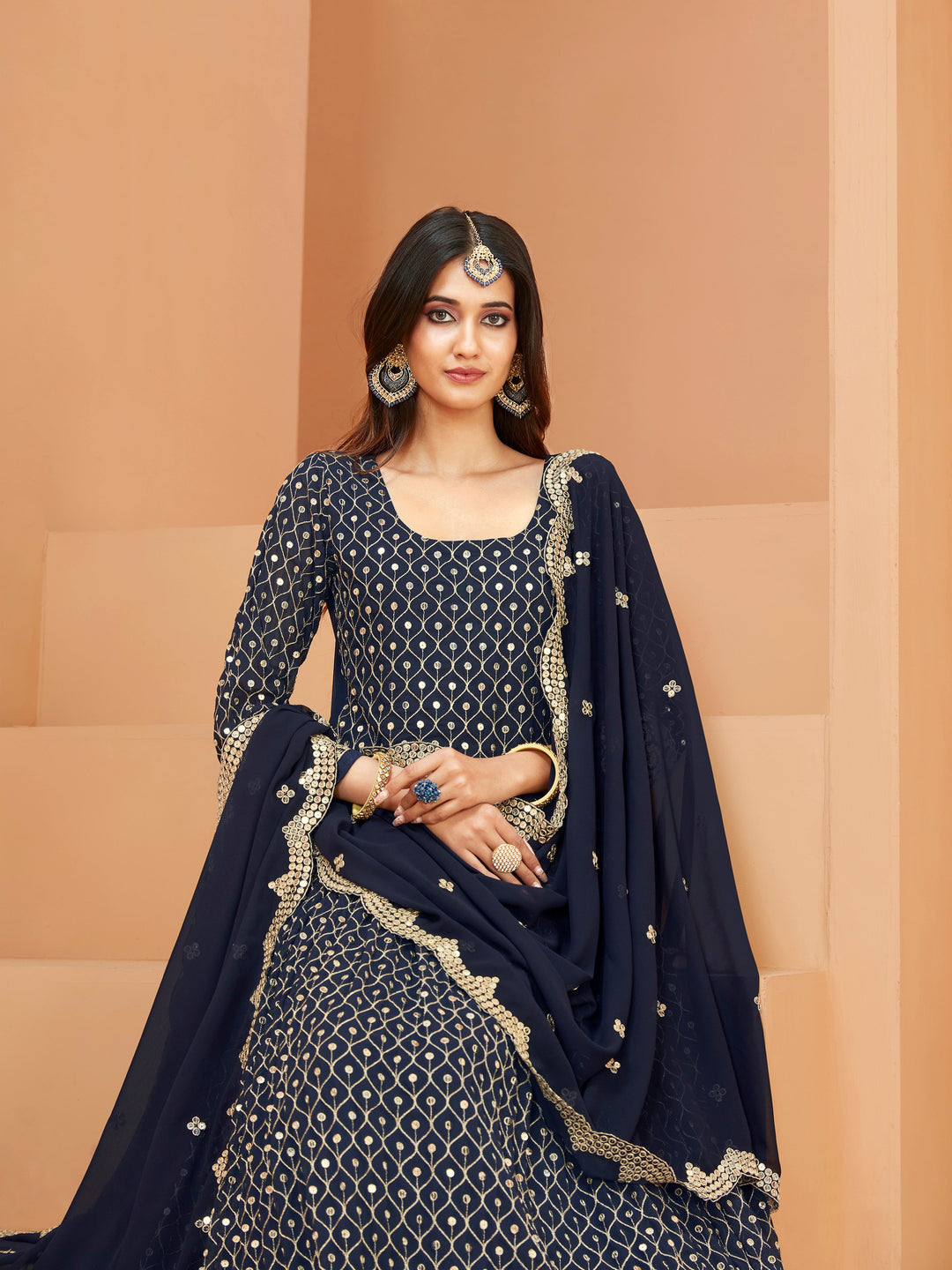 Elegant navy blue salwar kameez designed for festive occasions and cultural gatherings.