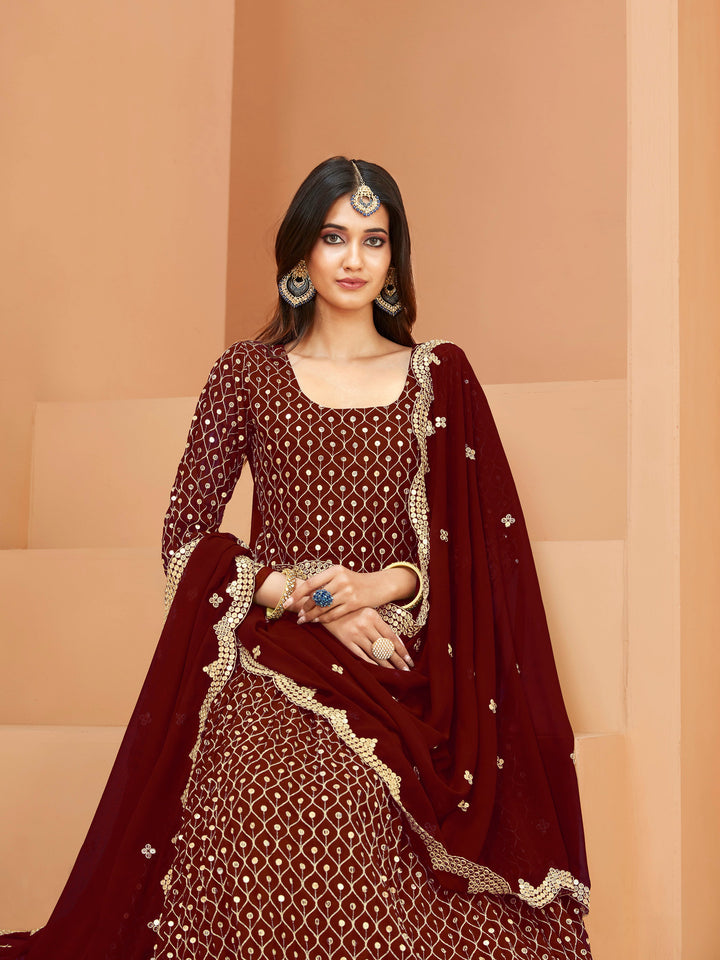 Vibrant maroon salwar kameez designed for modern women, ideal for festive occasions.