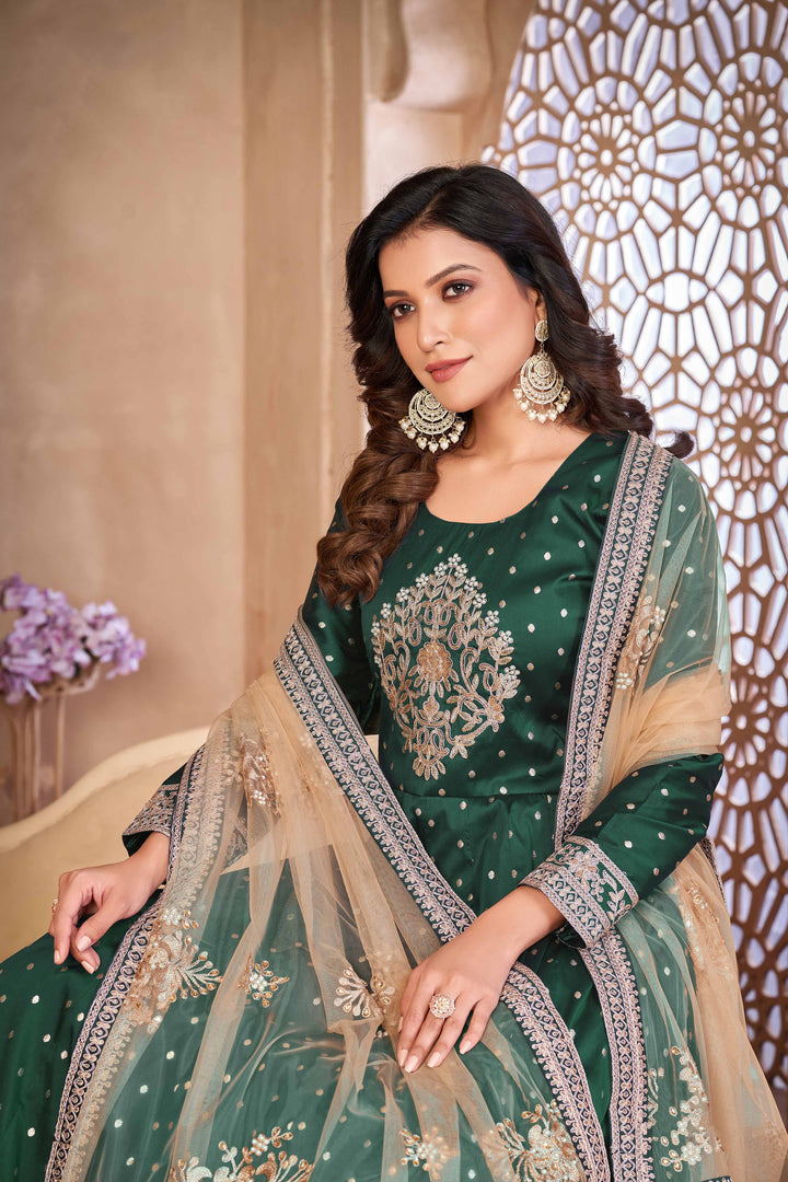 Elegant green salwar kameez designed for festive occasions and cultural gatherings.