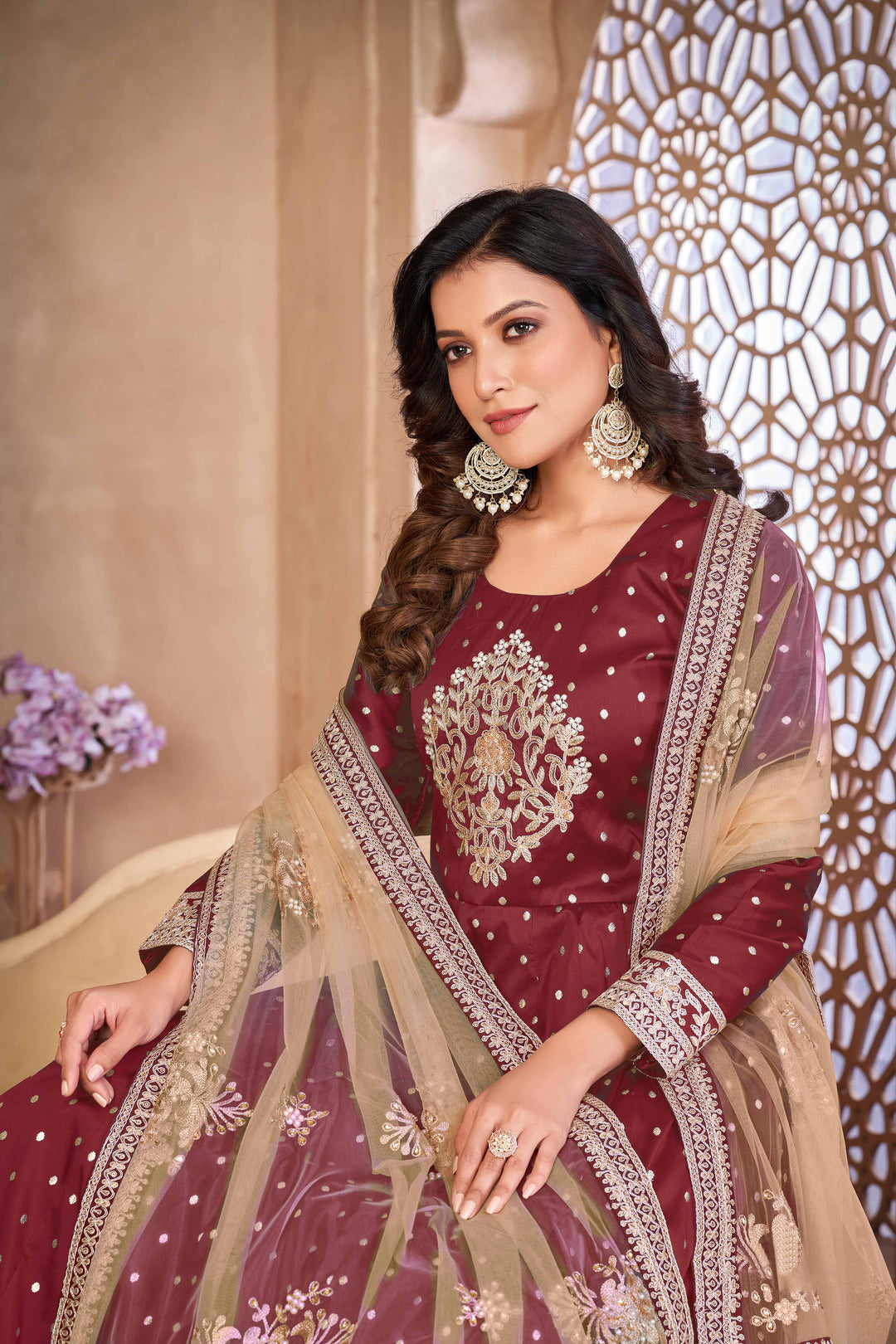 Elegant maroon salwar kameez designed for modern women, perfect for celebrations.