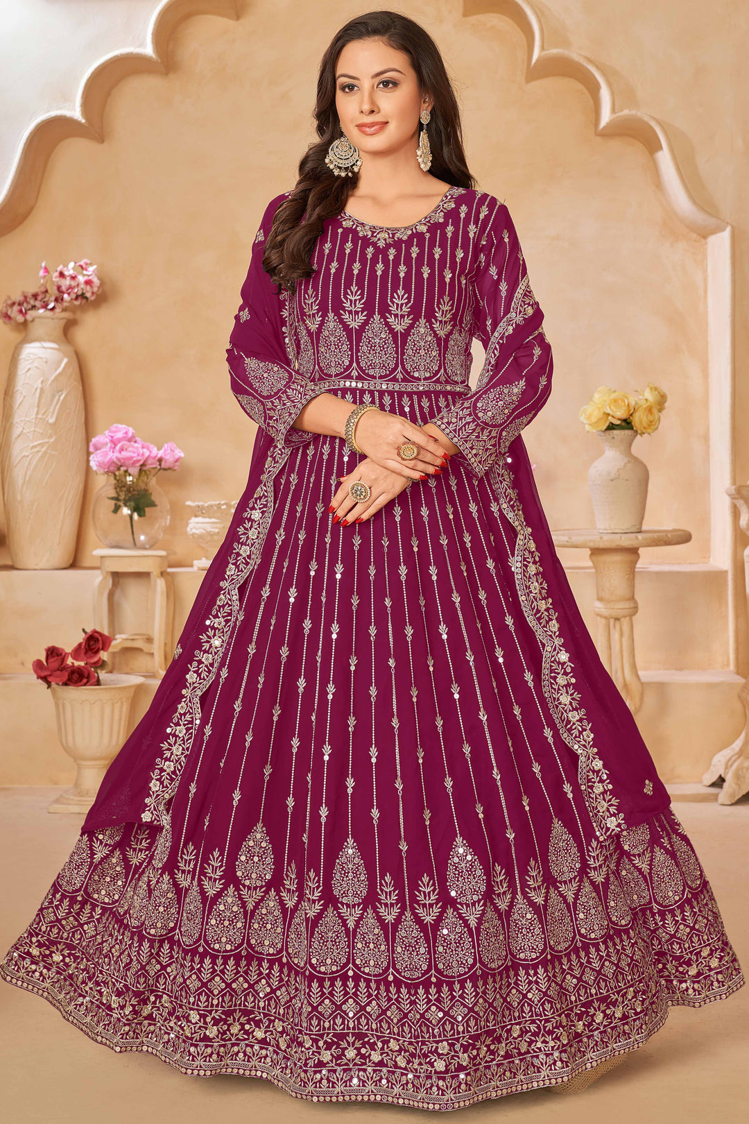 Chic rani pink salwar kameez designed for modern women, perfect for celebrations.