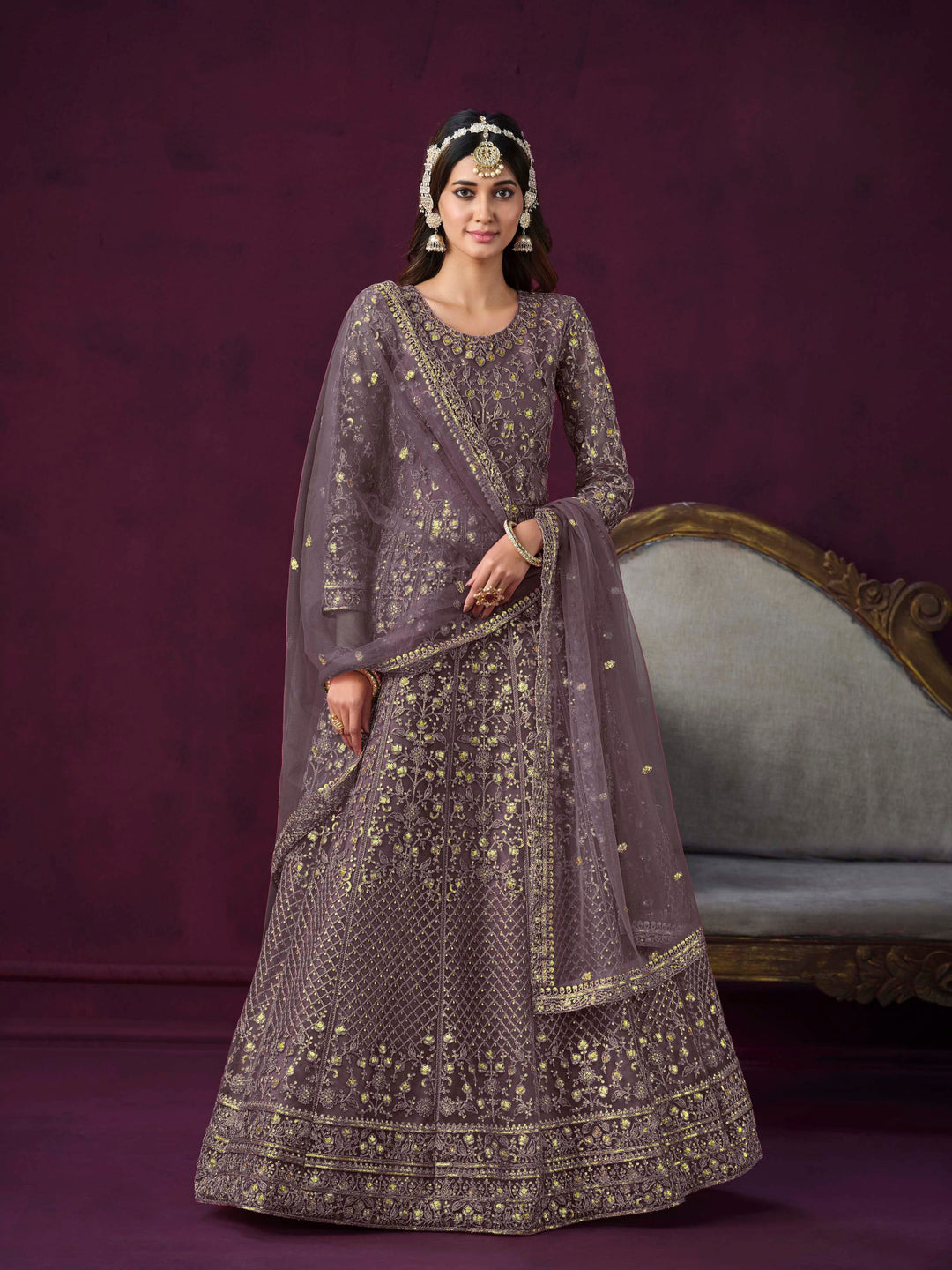 Elegant dusty purple salwar kameez designed for festive occasions and cultural gatherings.