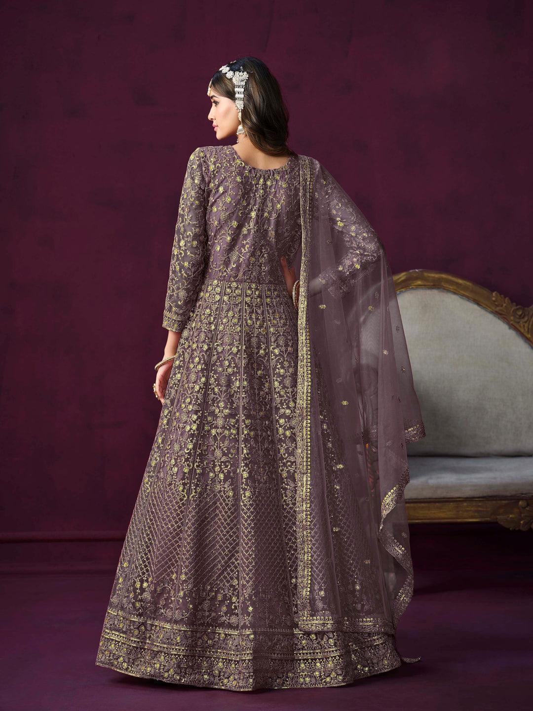 Chic dusty purple salwar kameez with heavy embroidery and zari work, ideal for special occasions.