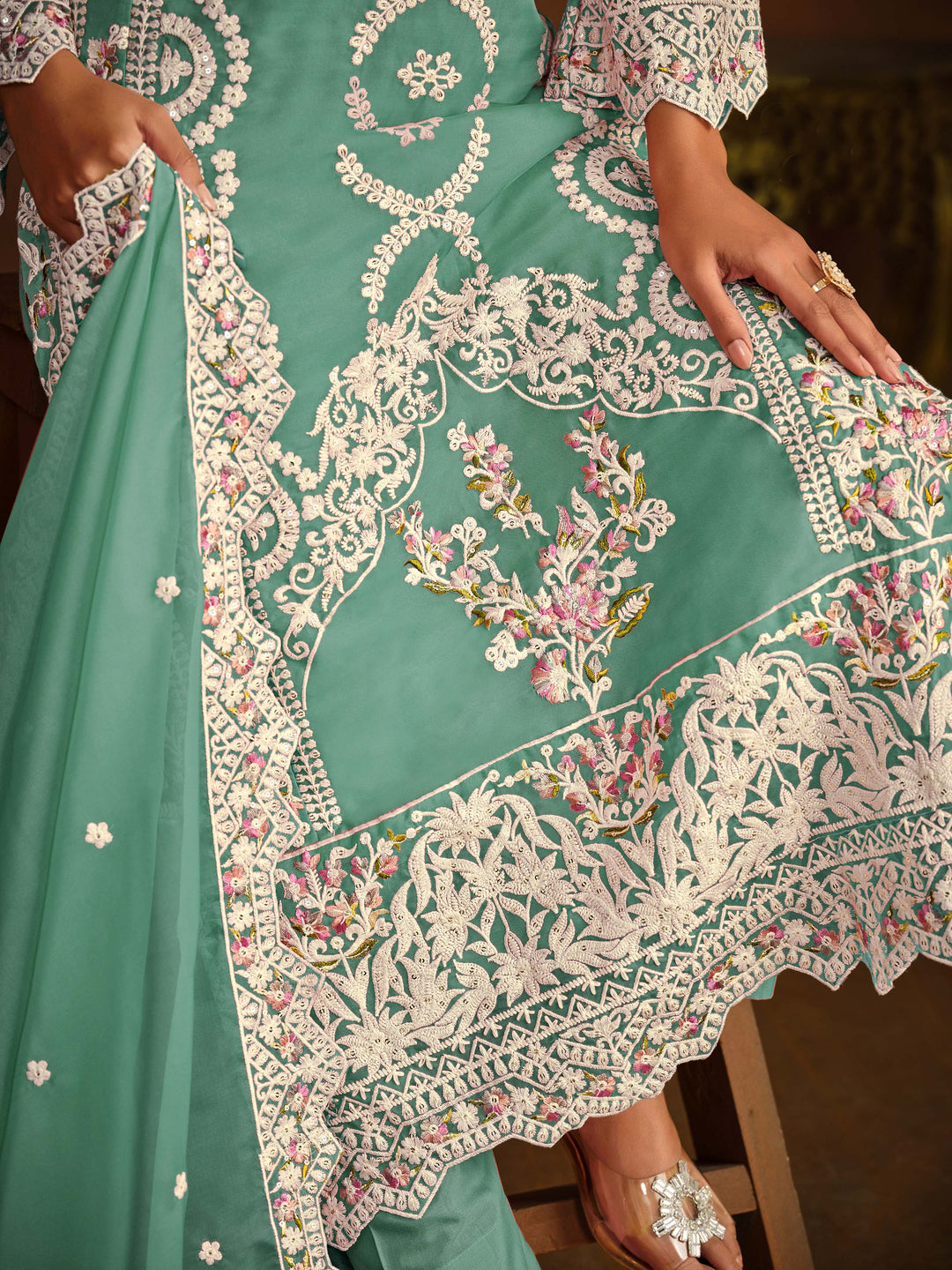 Stunning light green salwar kameez showcasing intricate detailing for weddings and celebrations.