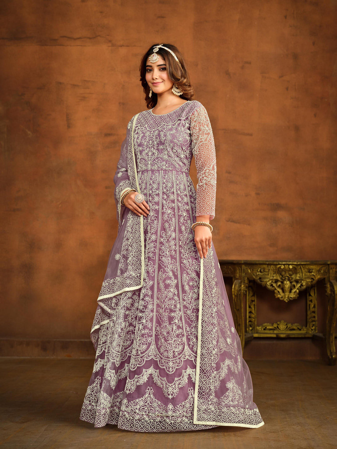 Elegant light purple salwar kameez designed for festive occasions and cultural gatherings.