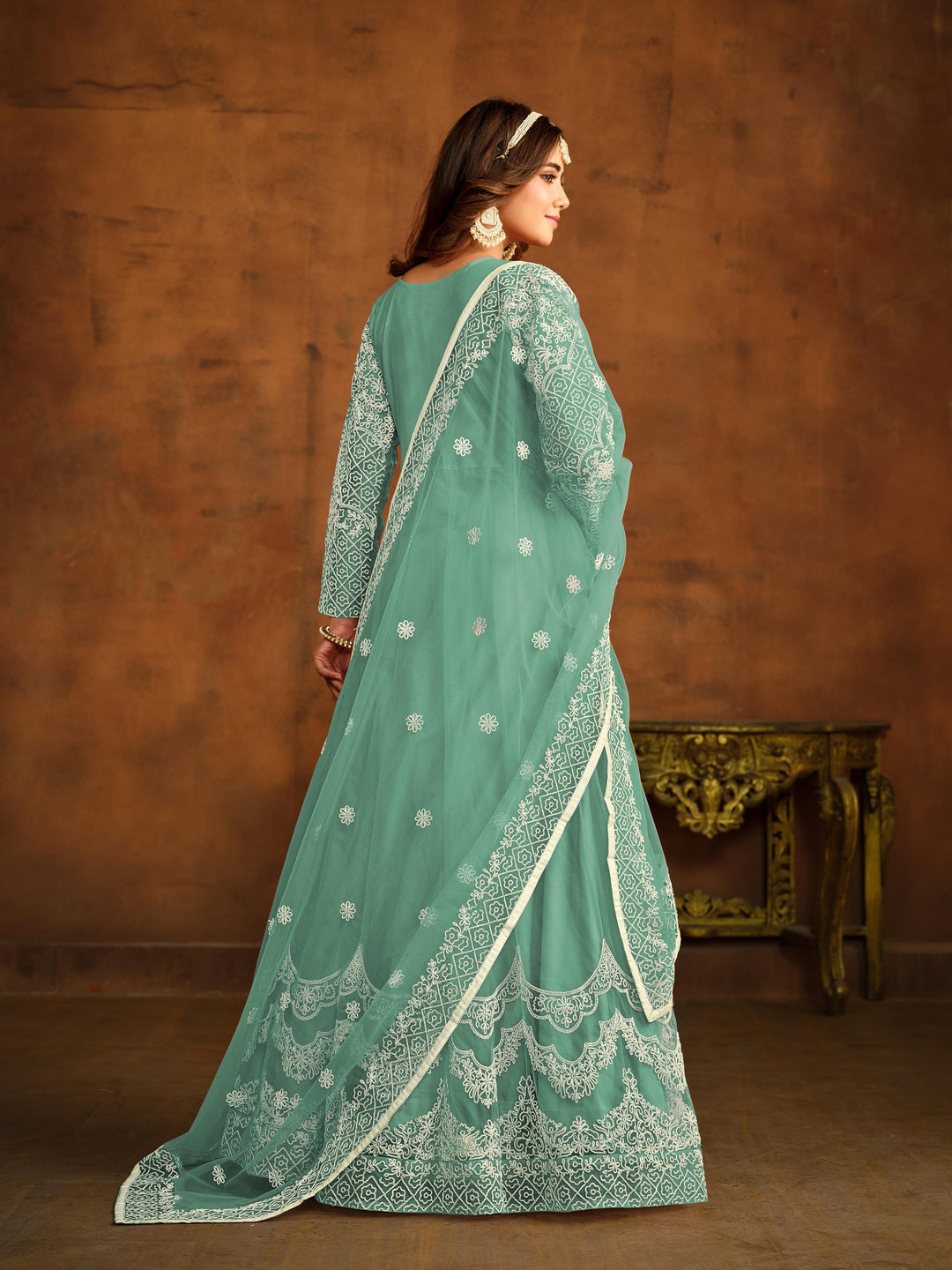 Stunning sea green salwar kameez showcasing intricate detailing for weddings and celebrations.