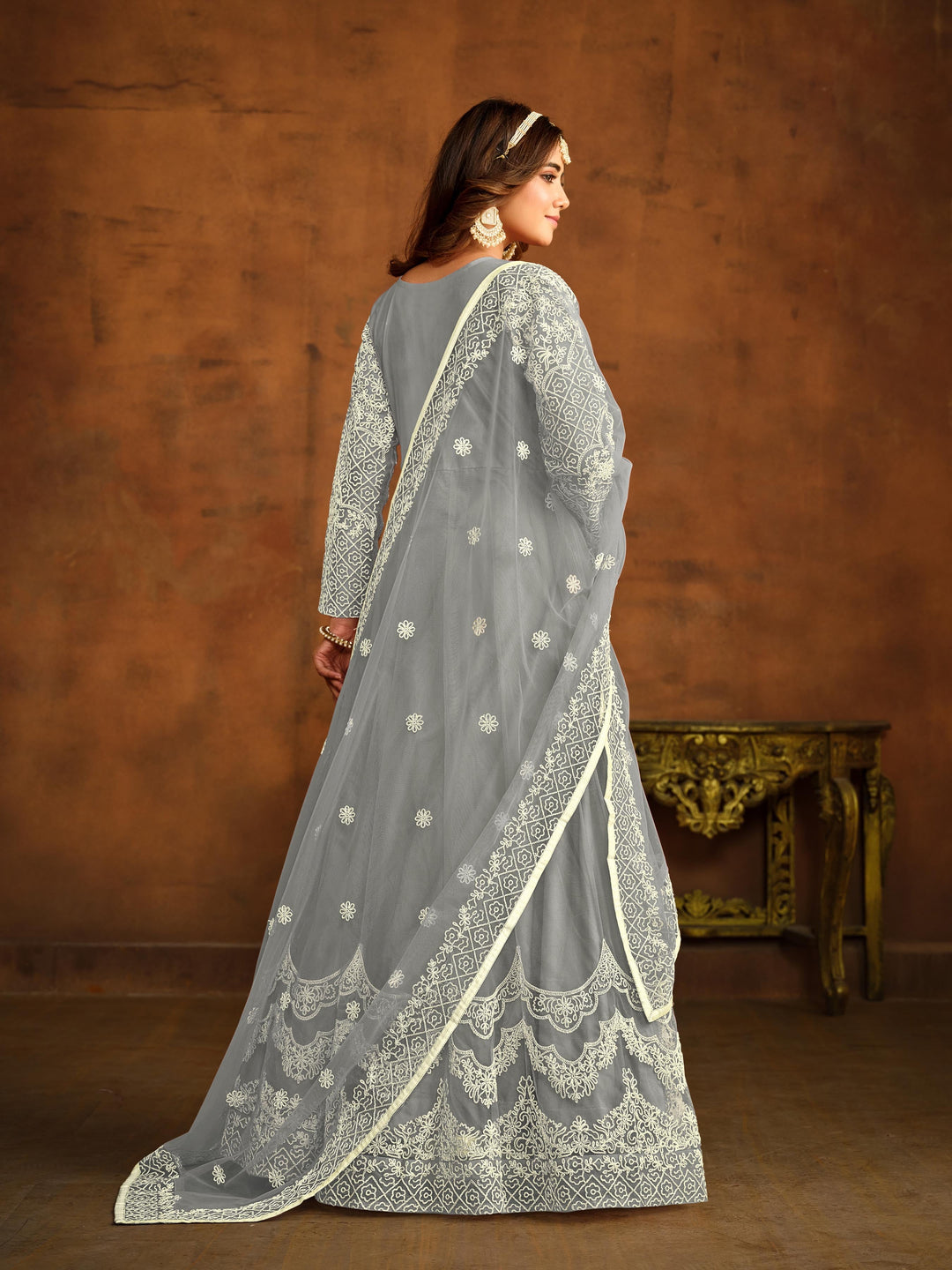 Designer grey salwar kameez in net fabric, heavy embroidery for USA customers.