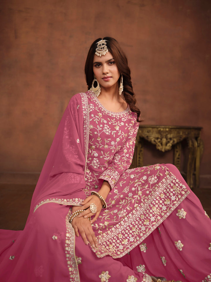 Designer pink salwar kameez in faux georgette, heavy embroidery with sequins for USA customers.