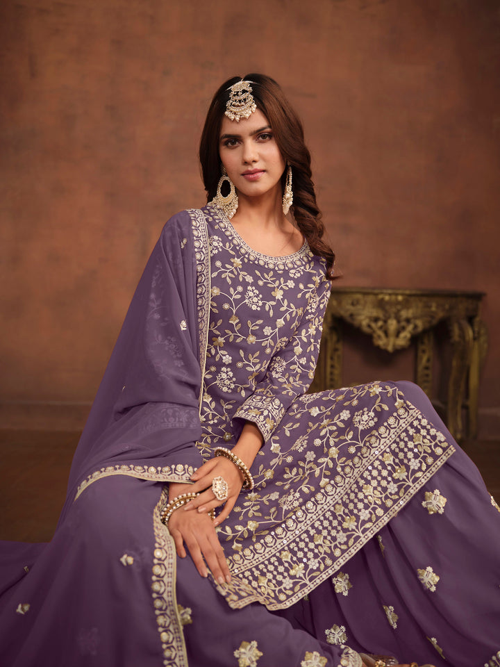 Designer purple salwar kameez in faux georgette, heavy embroidery and sequins for USA customers.